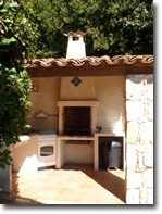 BBQ and cooker in the summer kitchen